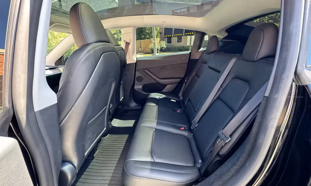 2023 Tesla Model Y Long Range AWD in Solid Black, Rear Seats